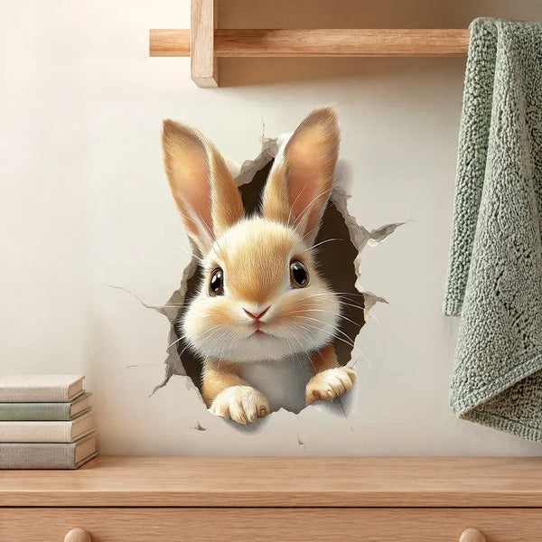 3D bunny breaking through the wall trompe-l'oeil wall sticker below a shelf, above a light oak chest of drawers