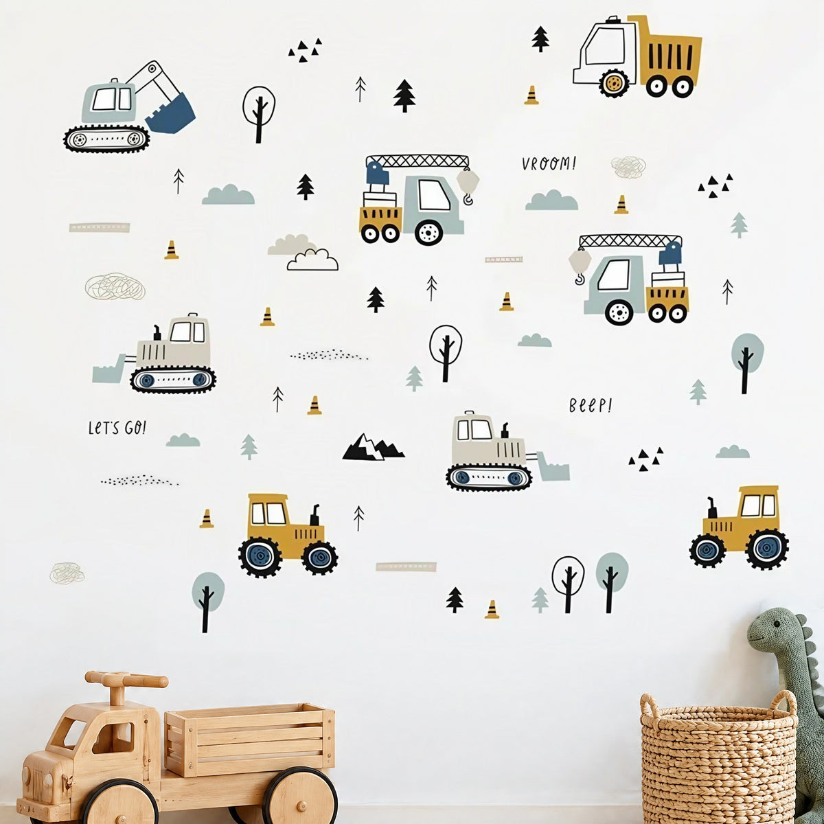 Kit de stickers engins de chantier jaune moutarde et bleu-gris sur un mur blanc, camion porteur en bois au premier plan